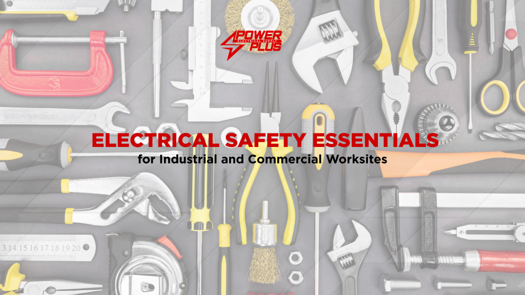 Assorted electrical tools and safety equipment arranged on a work surface, representing essential safety standards for industrial and commercial worksites.