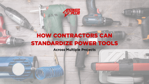 Assorted power tools including drills and electric equipment arranged on a wooden surface, illustrating tool standardization across multiple contractor projects.