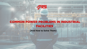 Industrial worker inspecting facility equipment to identify common power problems and electrical issues in an industrial setting