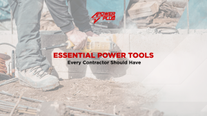 Worker using power tools on a construction site, highlighting essential equipment every contractor should have.