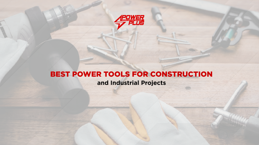 Power tools and construction equipment arranged on a wooden workbench for industrial and commercial projects.